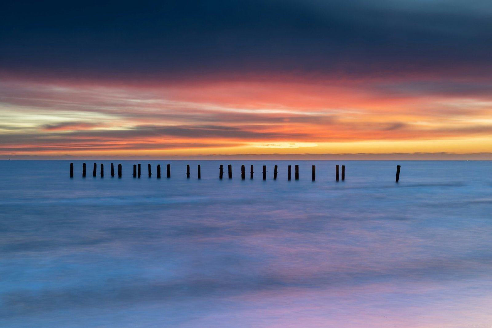 A long exposure of a sunset over the ocean